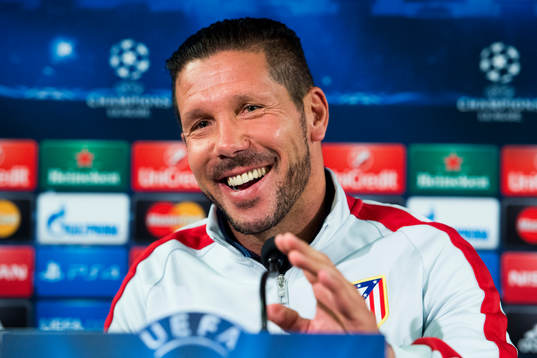 Atletico Madrids tränare Diego Simeone skrattar