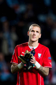s målvakt Robin Olsen deppar
