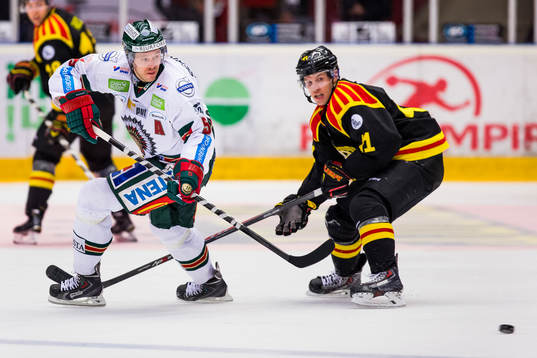 Frölundas Christian Bäckman och Brynäs Greg Scott
