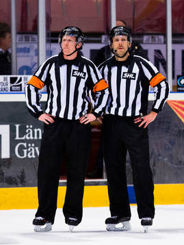 Domare Mikael Holm och domare Markus Linde