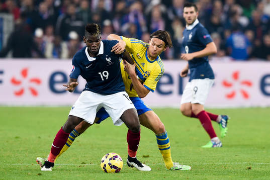 Frankrikes Paul Pogba och Sveriges Albin Ekdal