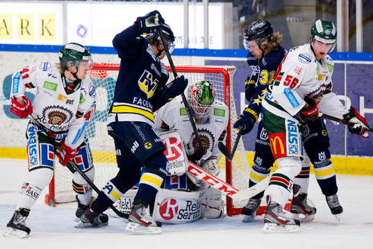 Frölundas Mathis Olimb, målvakt Lars Johansson och Erik