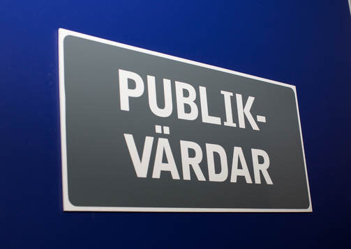 Dörr med skylt "Publikvärdar"