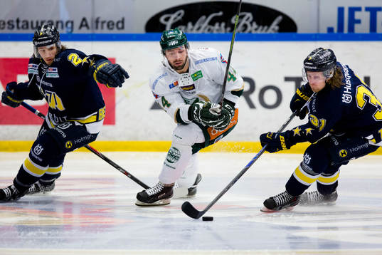 s Kristofer Berglund och HV71:s Mattias Tedenby (h)