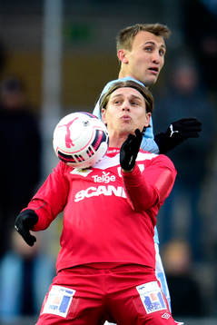 Assyriskas Fredrik Holster och Malmö FFs Magnus Wolff