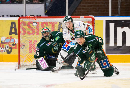 Färjestads  Daniel Gunnarsson och målvakt Justin Pogge