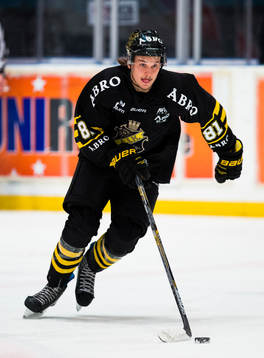 s Theodor Lennström med pucken