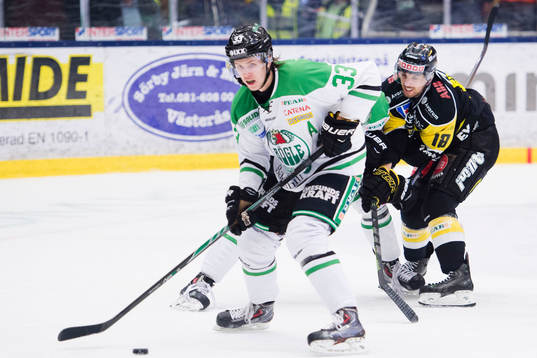 Rögles Niklas Hansson och Västerås Jeremy Williams