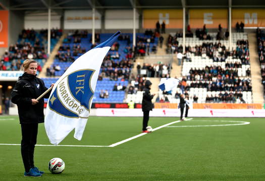 Flagga före match