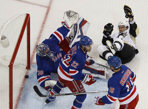 Pittsburgh Penguins Maxim Lapierre (R) celebrates a goal by