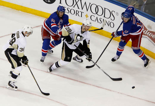 New York Rangers Carl Hagelin (2nd L) and Kevin Hayes fight