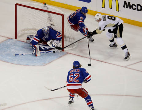 New York Rangers goalie Henrik Lundqvist makes a save