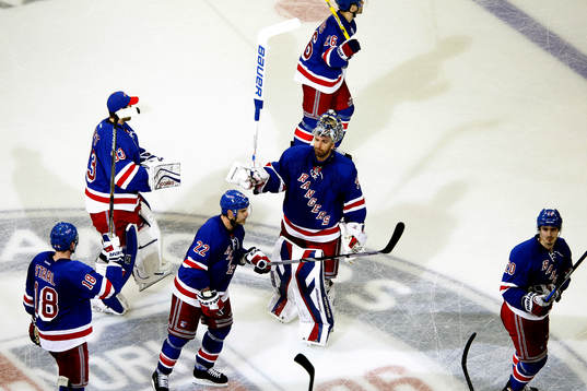 New York Rangers goalie Henrik Lundqvist (C) acknowledges