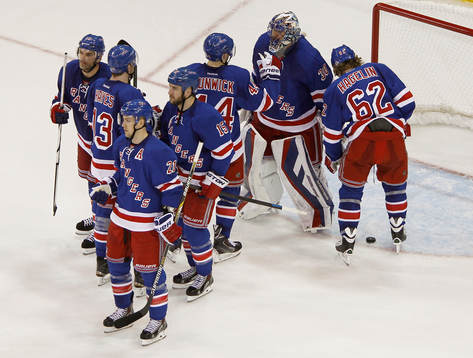 New York Rangers goalie Henrik Lundqvist (2nd R) is