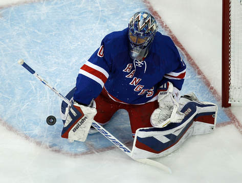 New York Rangers goalie Henrik Lundqvist makes a save