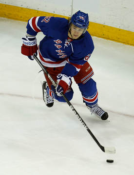 New York Rangers Carl Hagelin skates with the puck against