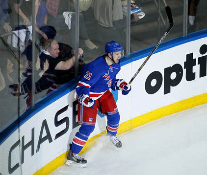 New York Ranger Derek Stepan celebrates scoring a goal