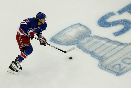 New York Rangers Carl Hagelin skates with the puck against