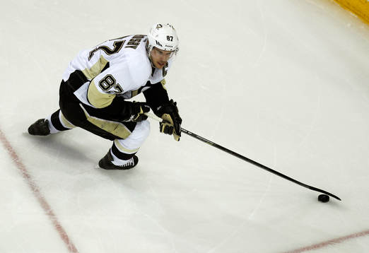 Pittsburgh Penguins Sidney Crosby skates with the puck