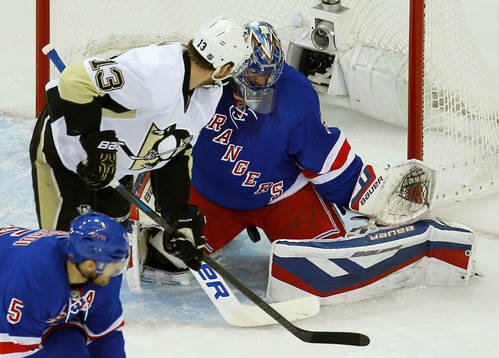 New York Rangers goalie Henrik Lundqvist makes a save