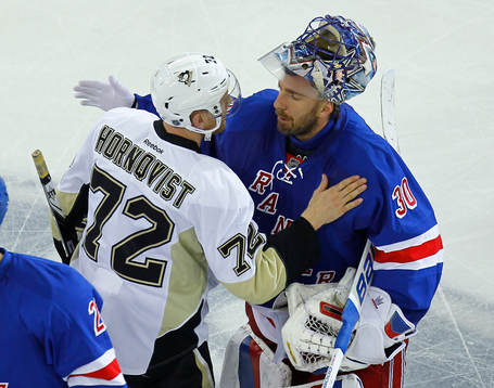 New York Rangers Henrik Lundqvist (R) embraces Pittsburgh