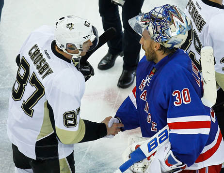 New York Rangers goalie Henrik Lundqvist (R) shakes hands
