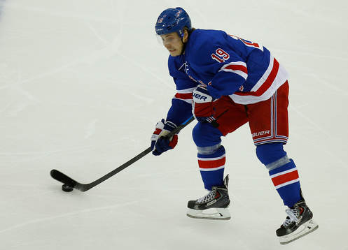 New York Rangers Jesper Fast passes the puck againt the