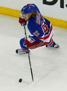 New York Rangers Carl Hagelin skates with the puck against