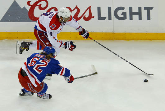 Washington Capitals Alex Ovechkin (8) skates past New York