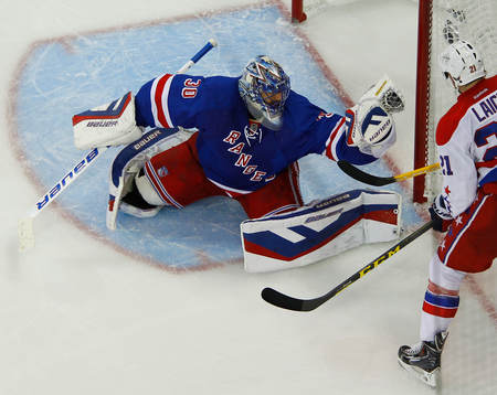 New York Rangers goalie Henrik Lundqvist makes a glove save