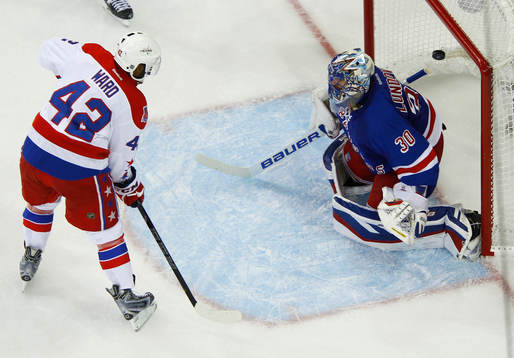 Washington Capitals Joel Ward (L) scores the game winning