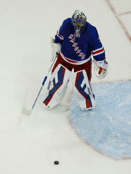 New York Rangers goalie Henrik Lundqvist shoots the puck