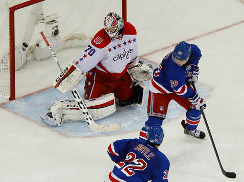 New York Rangers Jesper Fast (R) scores a goal past