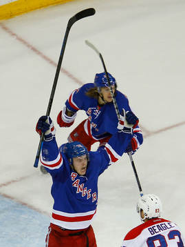New York Rangers Jesper Fast (C) celebrates with teammate