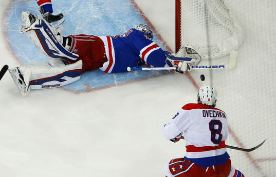 New York Rangers goalie Henrik Lundqvist makes a save