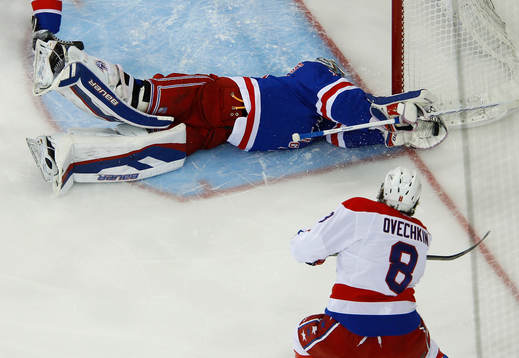 New York Rangers goalie Henrik Lundqvist makes a save