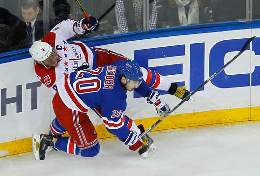 New York Rangers Chris Kreider checks Washington Capitals