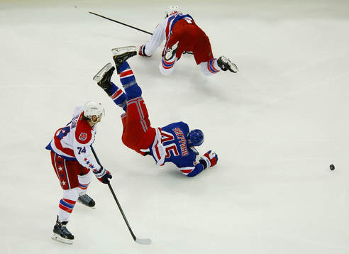 New York Rangers James Sheppard is sent flying by