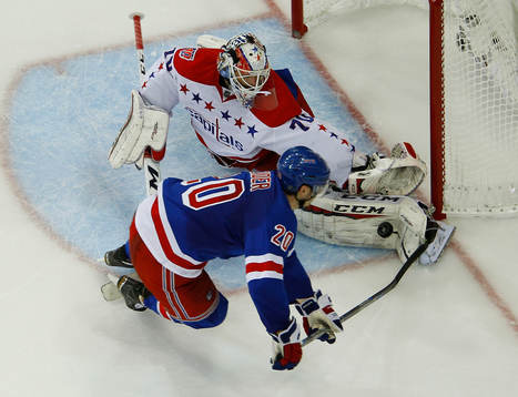 Washington Capitals goalie Braden Holtby makes a save