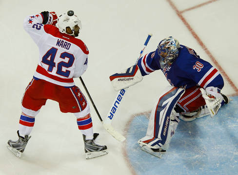 New York Rangers goalie Henrik Lundqvist makes a save