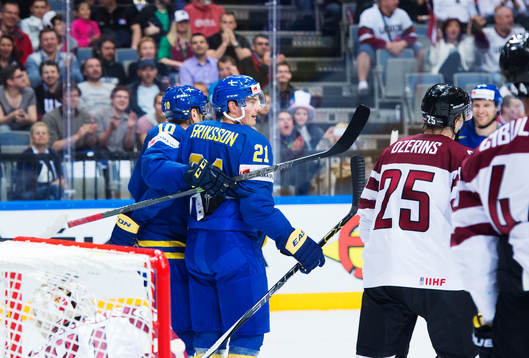 Sveriges Joakim Lindström och Loui Eriksson jublar