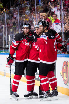 Kanadas Dan Hamhuis, Sidney Crosby och Taylor Hall jublar