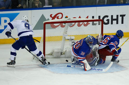 Tampa Bay Lightning Tyler Johnson (L) scores a goal past