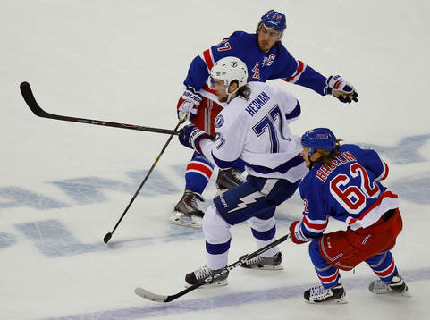 Tampa Bay Lightning Victor Hedman (R) is covered by New