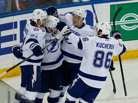 Tampa Bay Lightning Tyler Johnson (2nd L) celebrates his