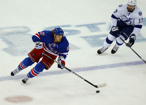 New York Rangers Carl Hagelin skates away from Tampa Bay