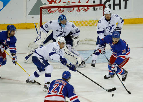 Tampa Bay Lightning Valtteri Filppula (51) is covered by