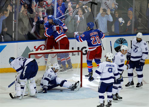 New York Rangers Derek Stepan (rear L) celebrates scoring