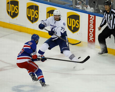 Tampa bay Lightning Victor Hedman (R) passes the puck past
