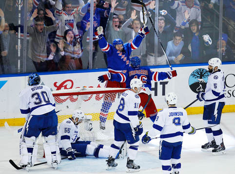 New York Rangers Derek Stepan (top) celebrates scoring with